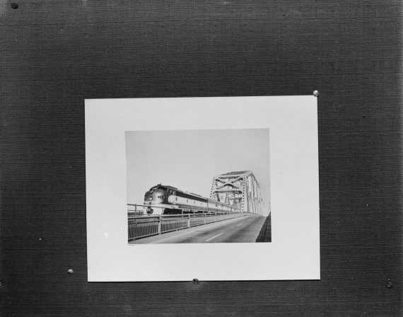Train next to a highway 2 of 2