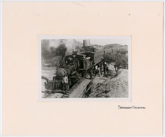 T&P Train #144 With Group of Men