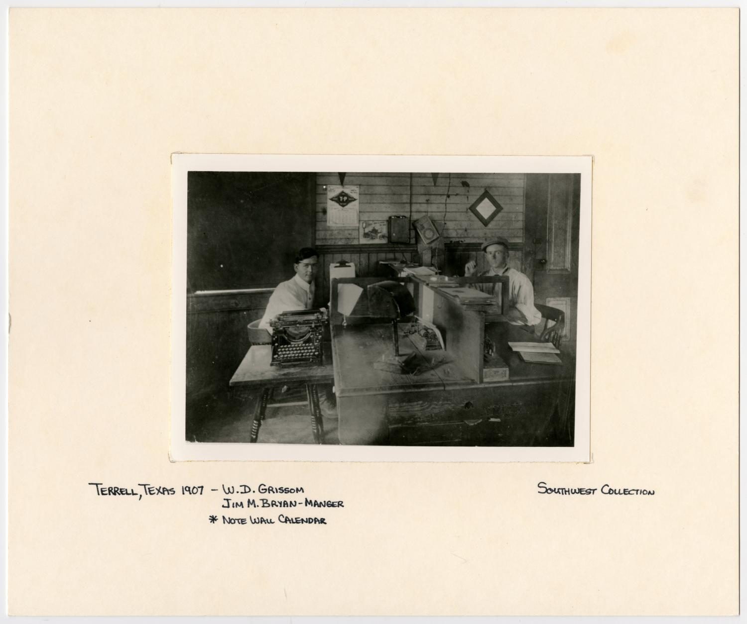 Two Men at a Desk